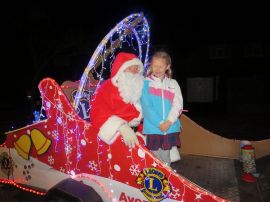 Father Christmas with a very happy child